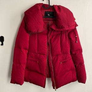 Zara woman down jacket with 4 zipper pockets.